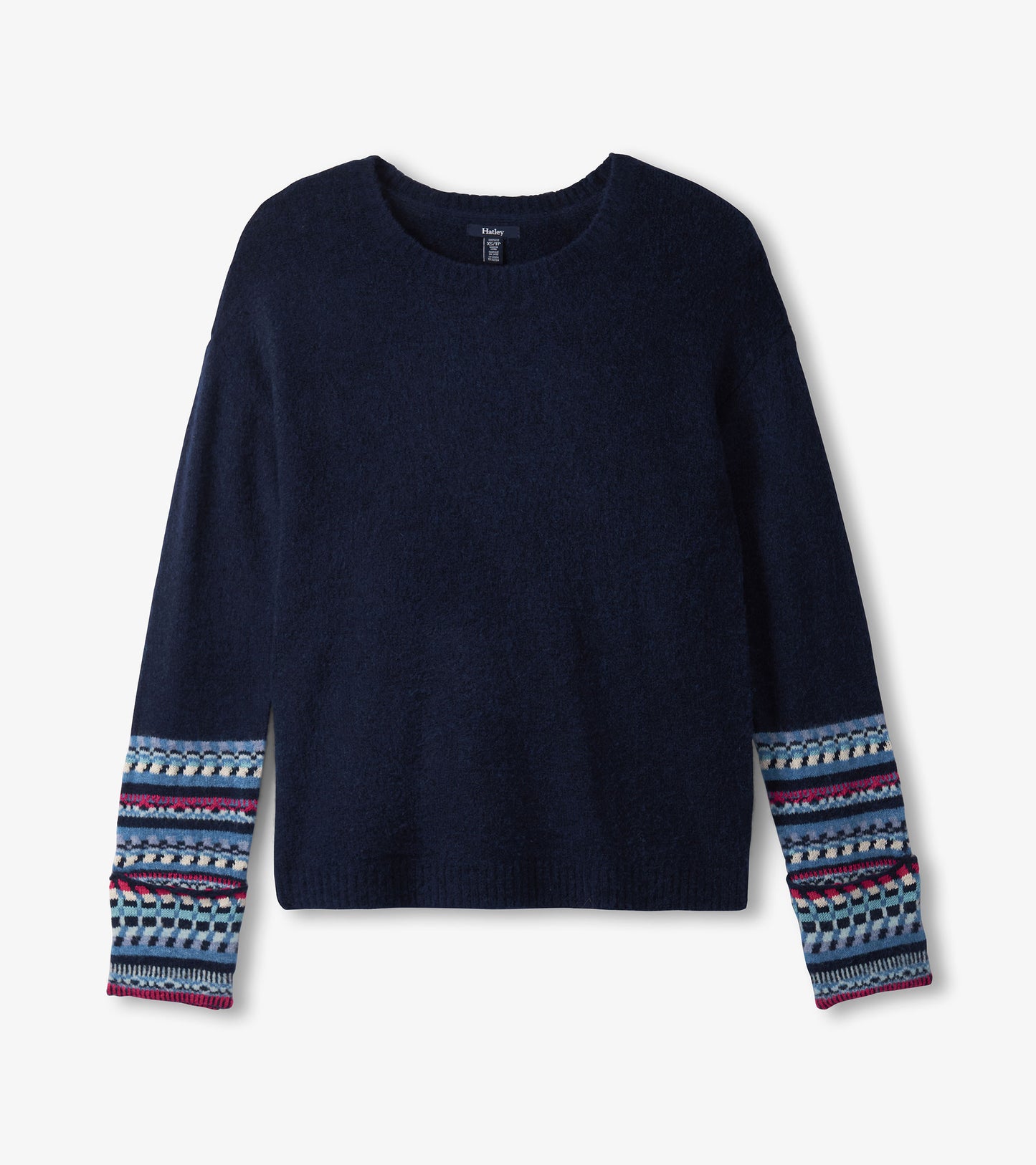 Navy sweater with a soft texture and patterned jacquard cuffs in blue, red, and white. Round neckline and long sleeves.