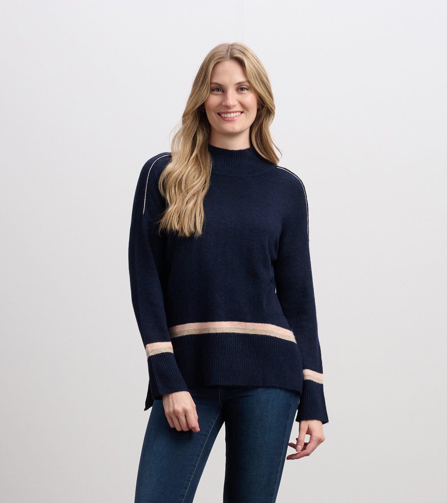 Navy mock neck sweater with light pink stripes, featuring long sleeves and a relaxed fit.