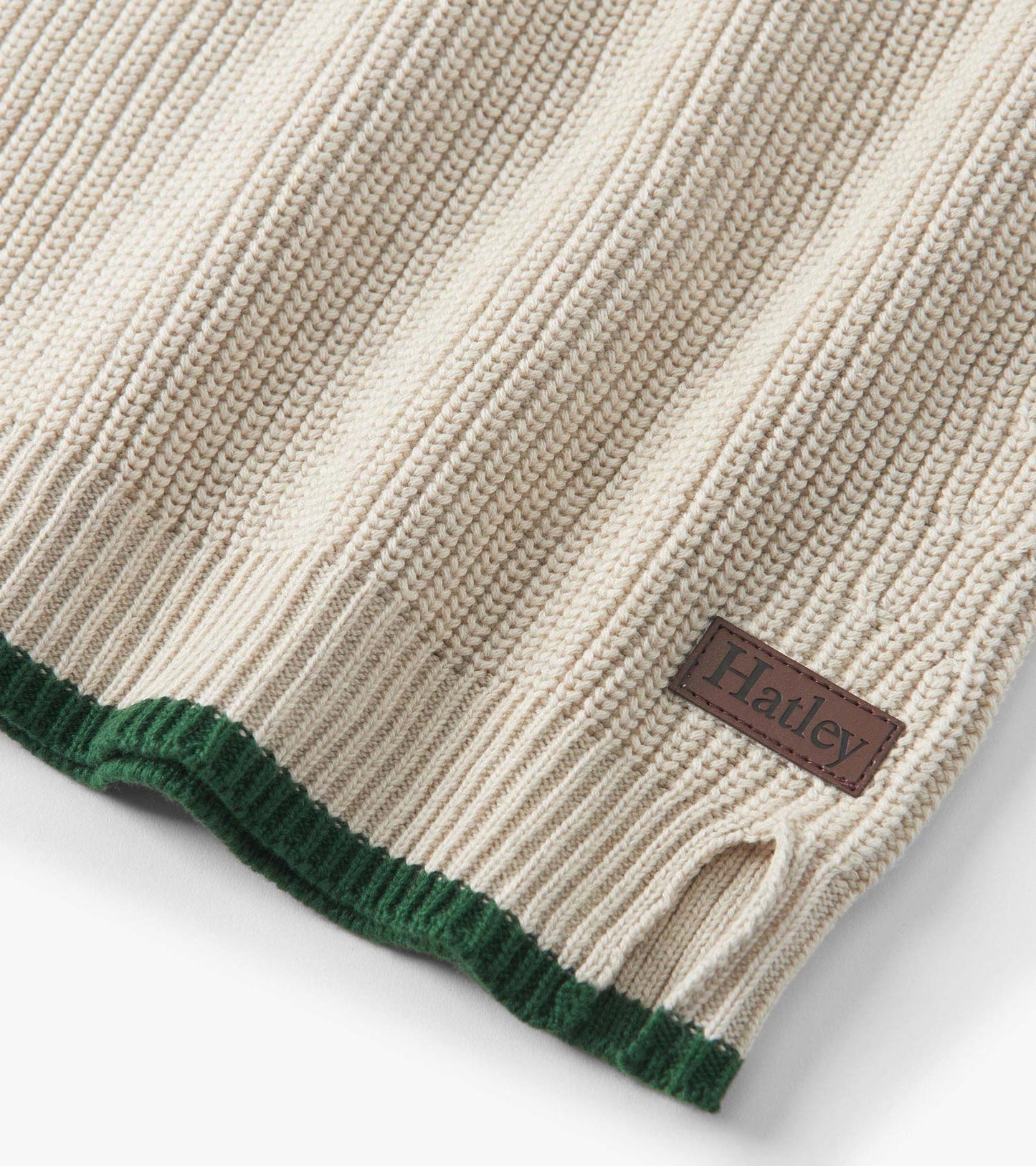 Oatmeal melange sweater with ribbed texture, green hem, and button neck detail, suitable for boys.