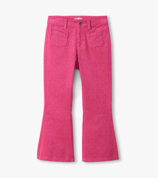 Flared pants in bright raspberry color with a subtle shimmer, featuring patch pockets and a fitted waist.