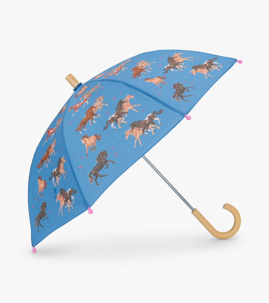 Blue umbrella featuring colorful horse illustrations and pink accents, designed for girls.
