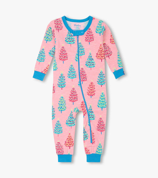 Pink cotton sleeper for baby girls featuring colorful bottle brush trees and blue trim, with a front zipper closure.