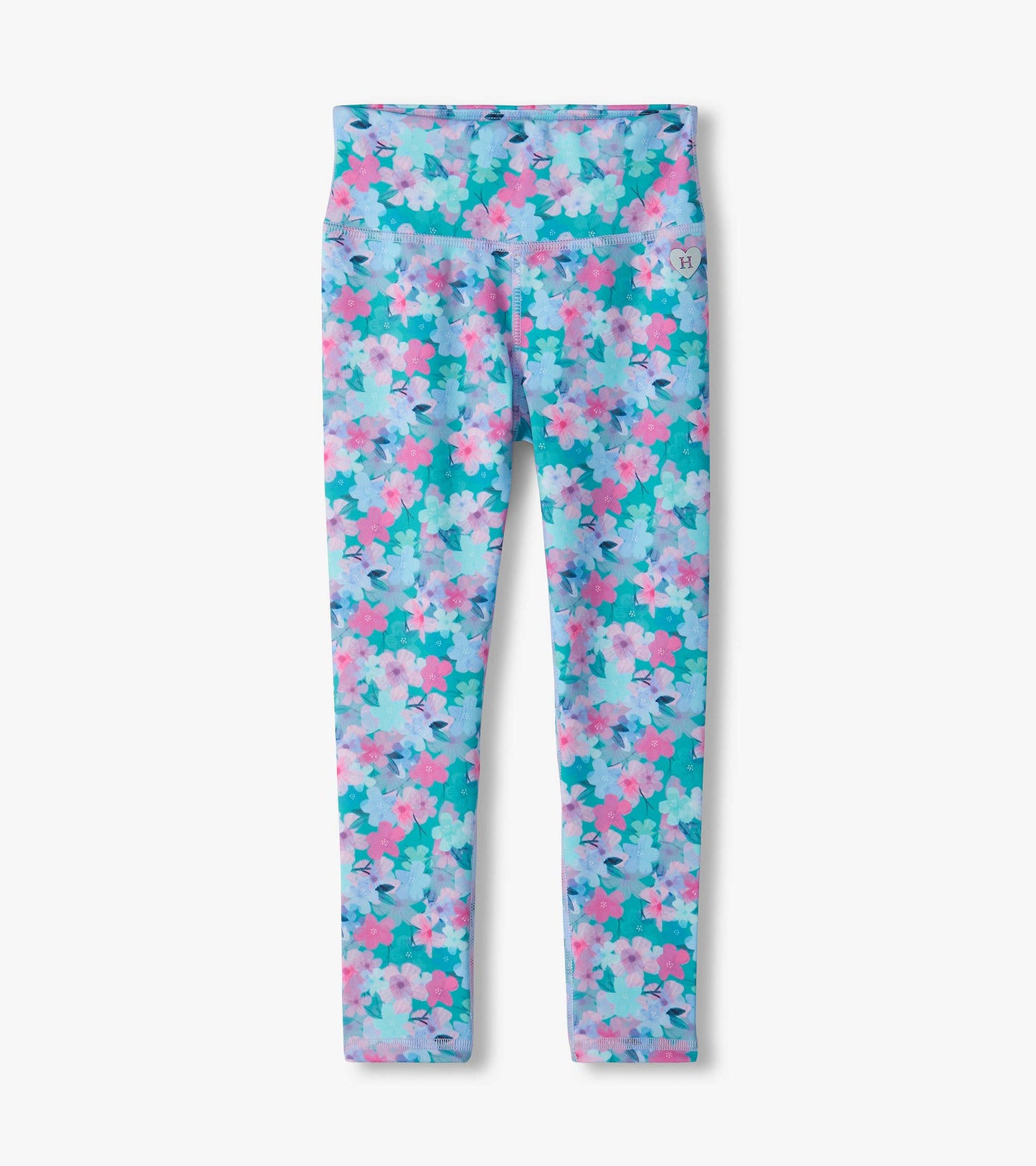 Kids floral active leggings with teal background, pink and light blue flowers, and a wide waistband