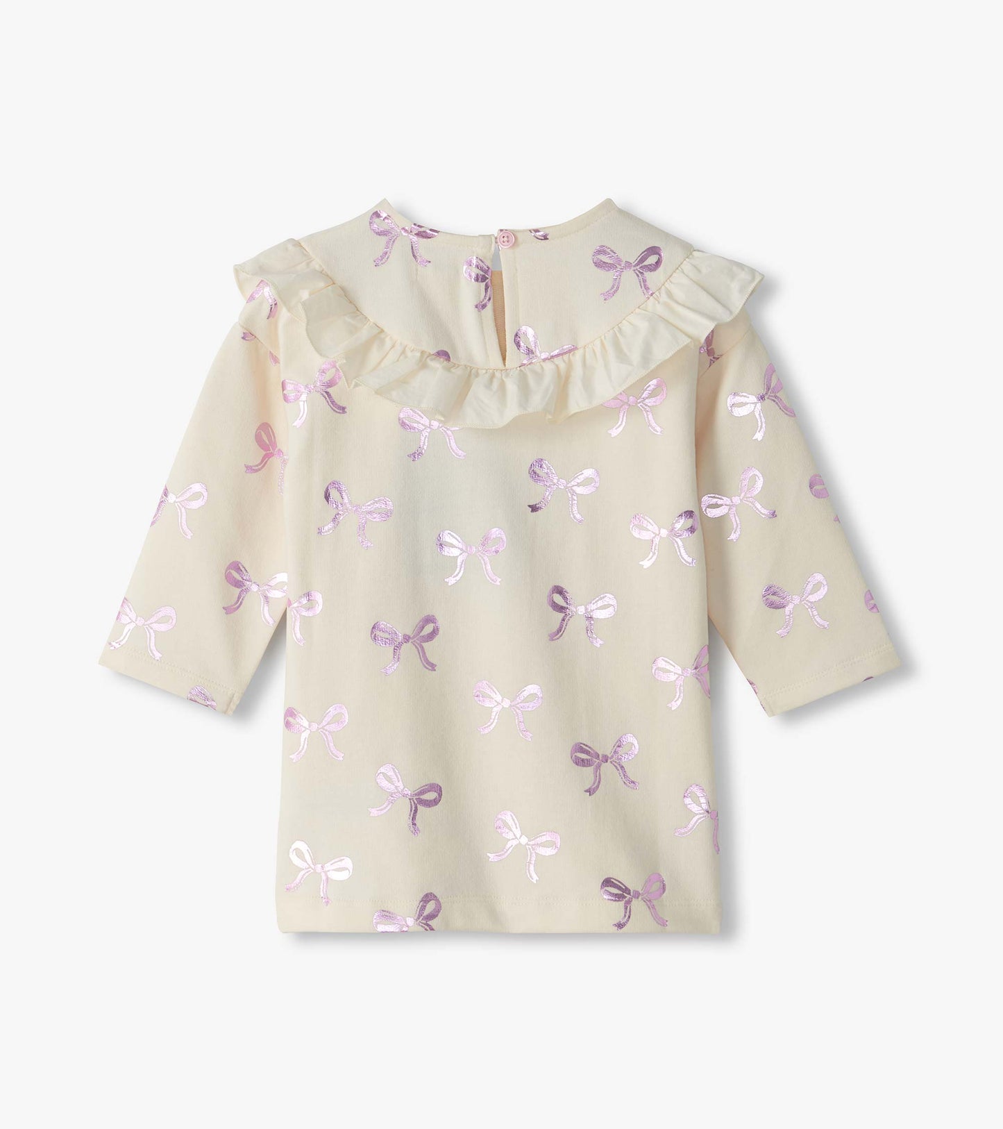 Back view of infant cream long sleeve dress with ruffle yoke, pink foil bow print, and button closure