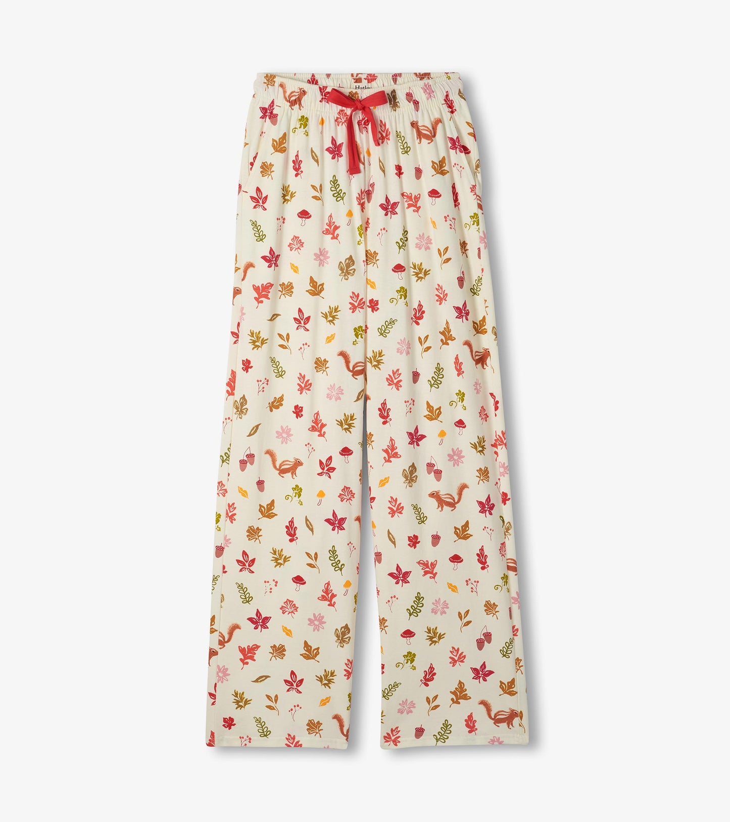 Pajama pants with red drawstring and fall print with leaves, acorns, mushrooms, and squirrels