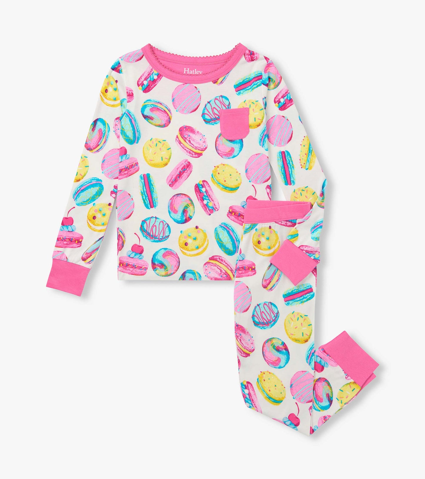Kids pajama set with colorful macaron print, pink trim, long sleeves, chest pocket, and matching pants