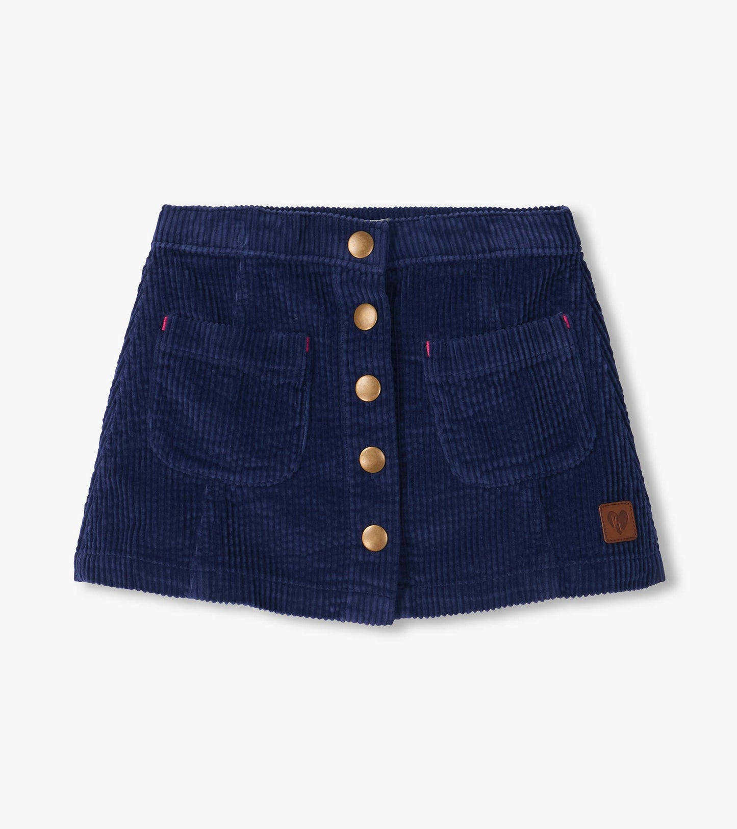 Patriot blue A-line skirt with front snap buttons, two front pockets, and a small logo patch near the hem