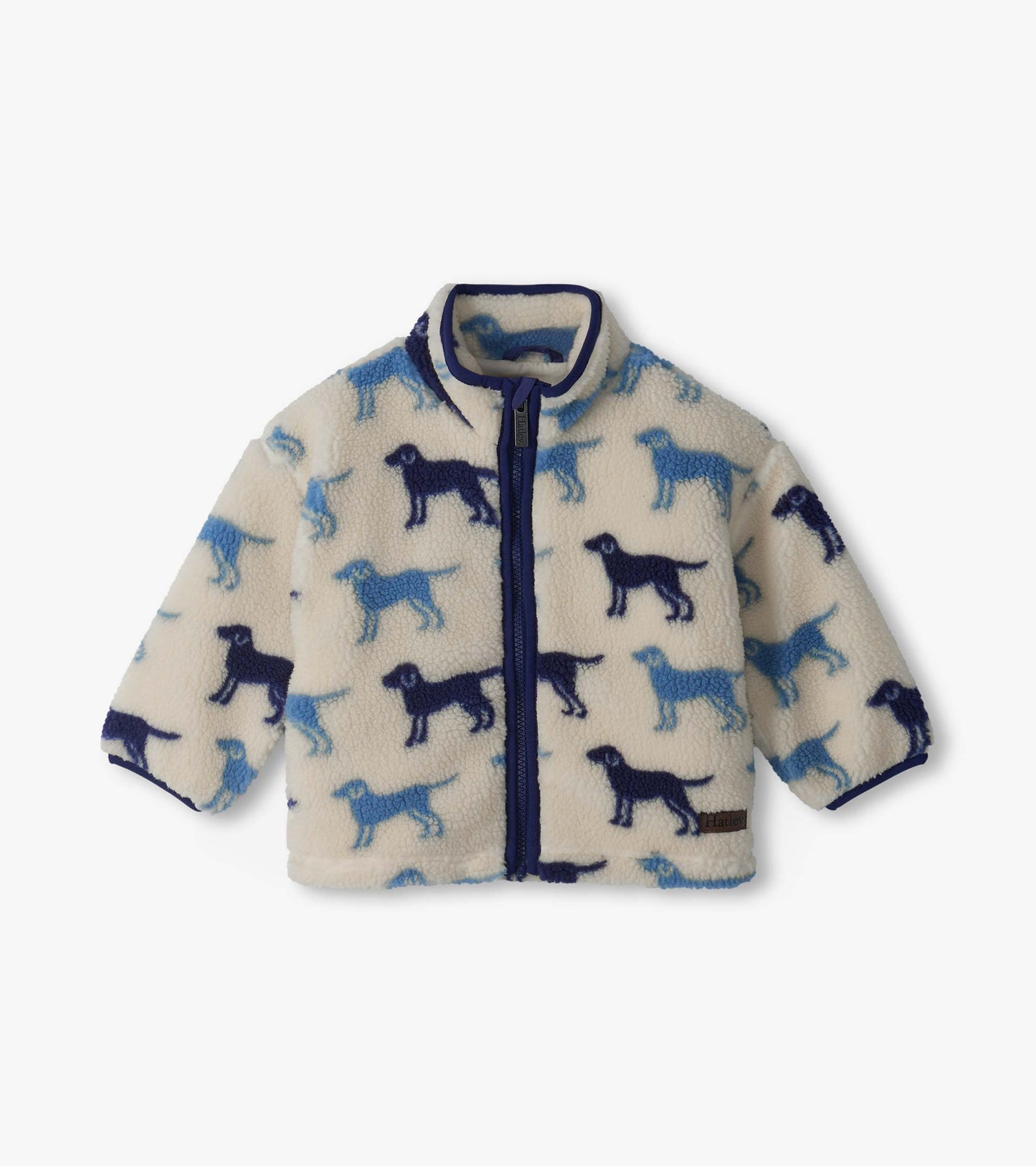 Infant mock neck zip jacket in cream with blue dog silhouettes and dark blue trim, front view