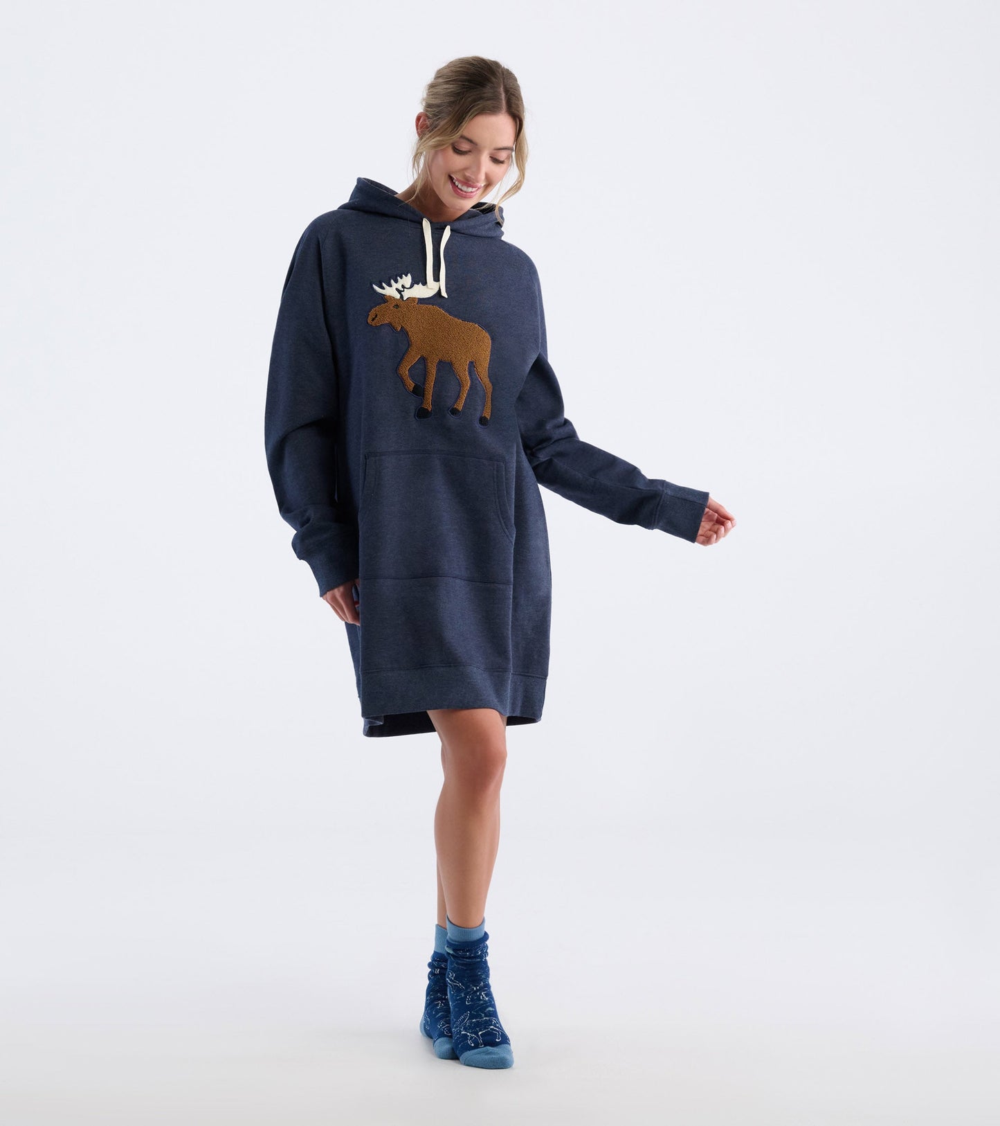 Navy oversized hoodie featuring a brown moose graphic, front pocket, and drawstring hood, worn by a model.