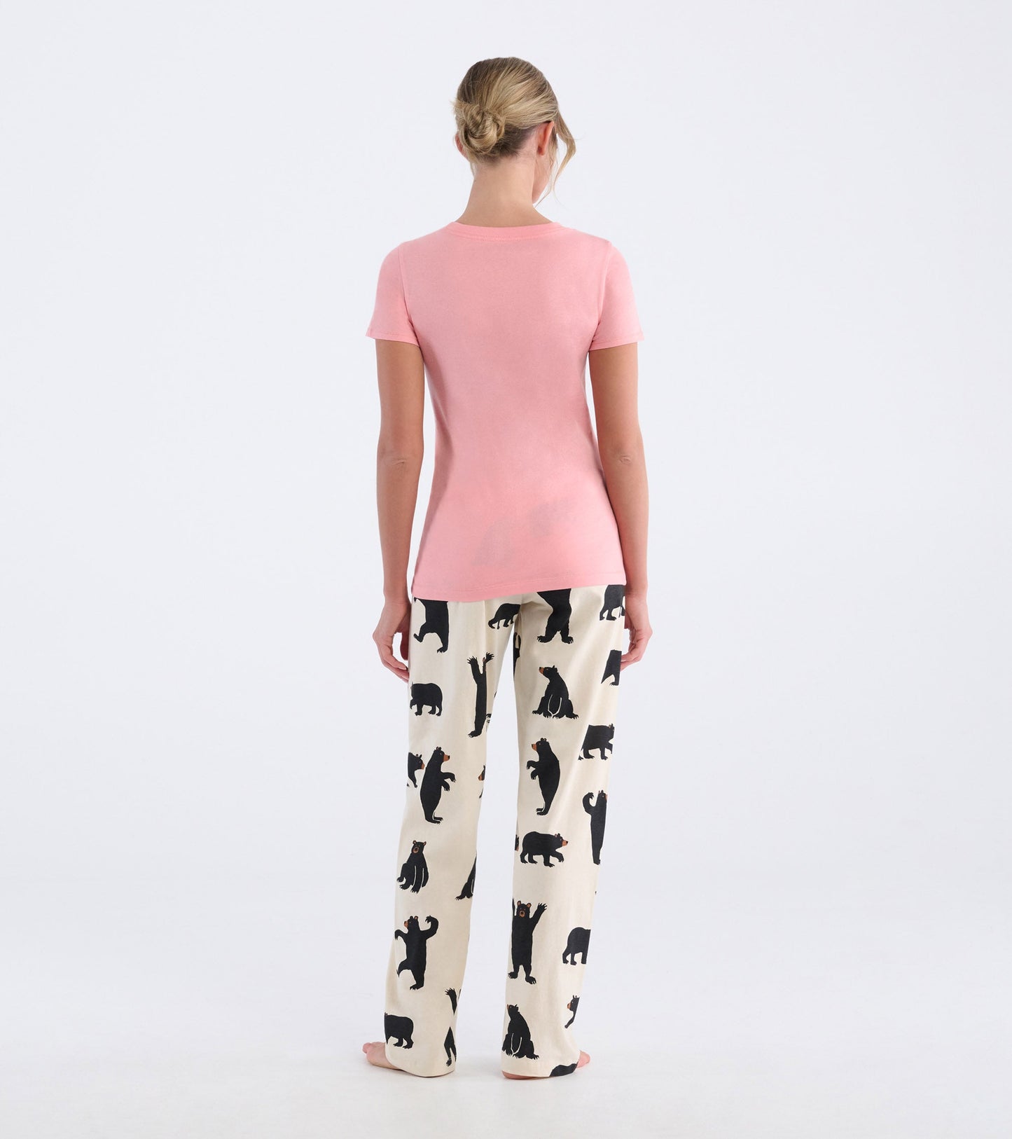 Black cotton pajama pants featuring a playful black bear pattern, designed for comfort and relaxation.