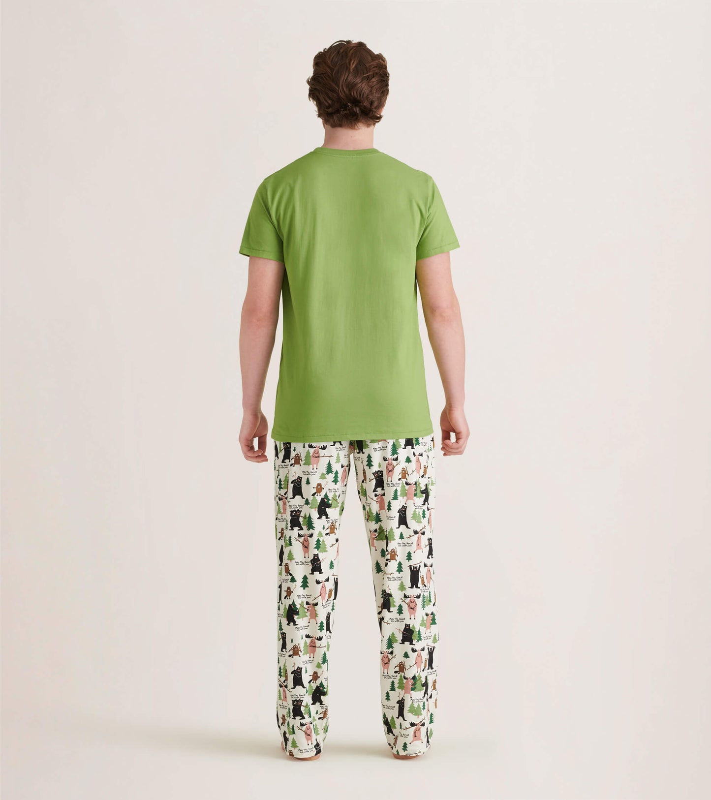 Men's stretch cotton pajama pants featuring a playful forest animal print on a light background.
