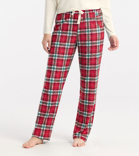 Red plaid polyknit pajama pants with an elastic waistband and pockets, ideal for cozy holiday lounging.