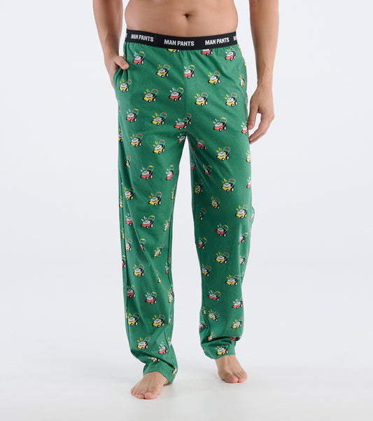Green pajama pants featuring a playful lawnmower print, with an elastic waistband and a relaxed fit.