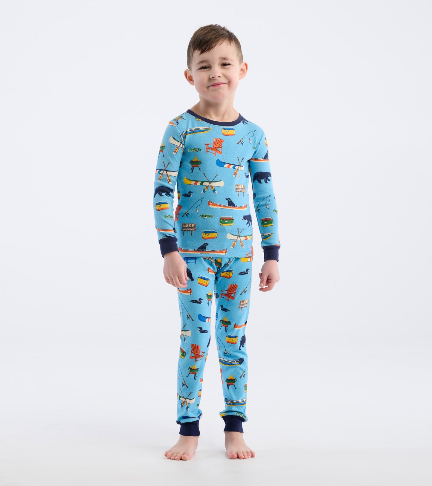 Blue kids' pajama set featuring playful lake-themed patterns, long sleeves, and matching pants with ribbed cuffs.