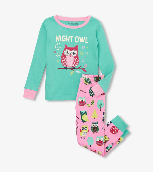 Turquoise long-sleeve pajama top with owl graphic and pink accents, paired with pink pants featuring colorful owl and tree p…