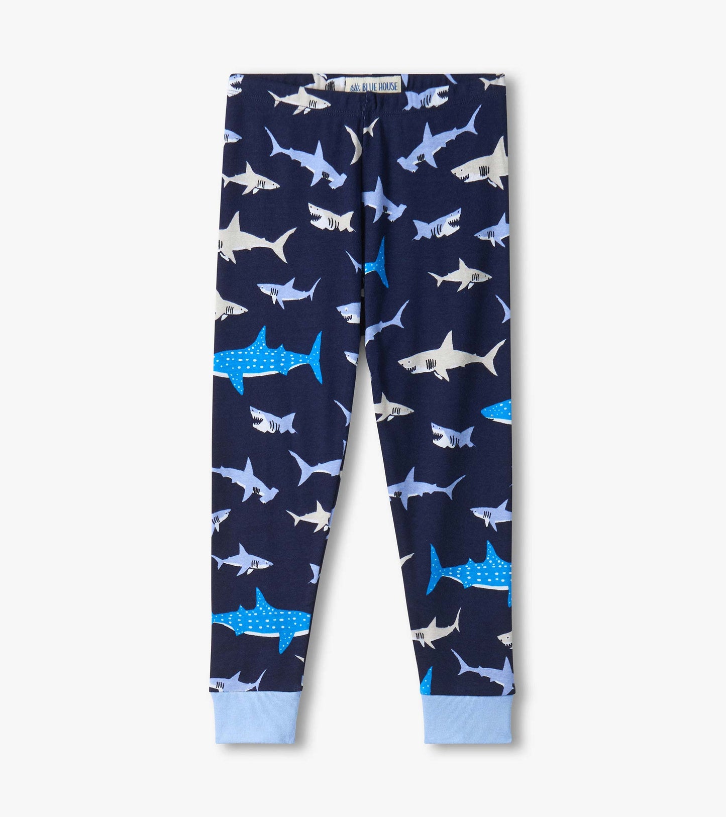Navy kids pajama pants with allover shark print and light blue cuffs, front view