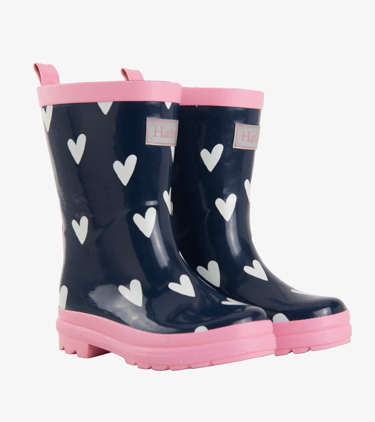 Navy rubber boots with white heart patterns and pink trim, designed for kids.