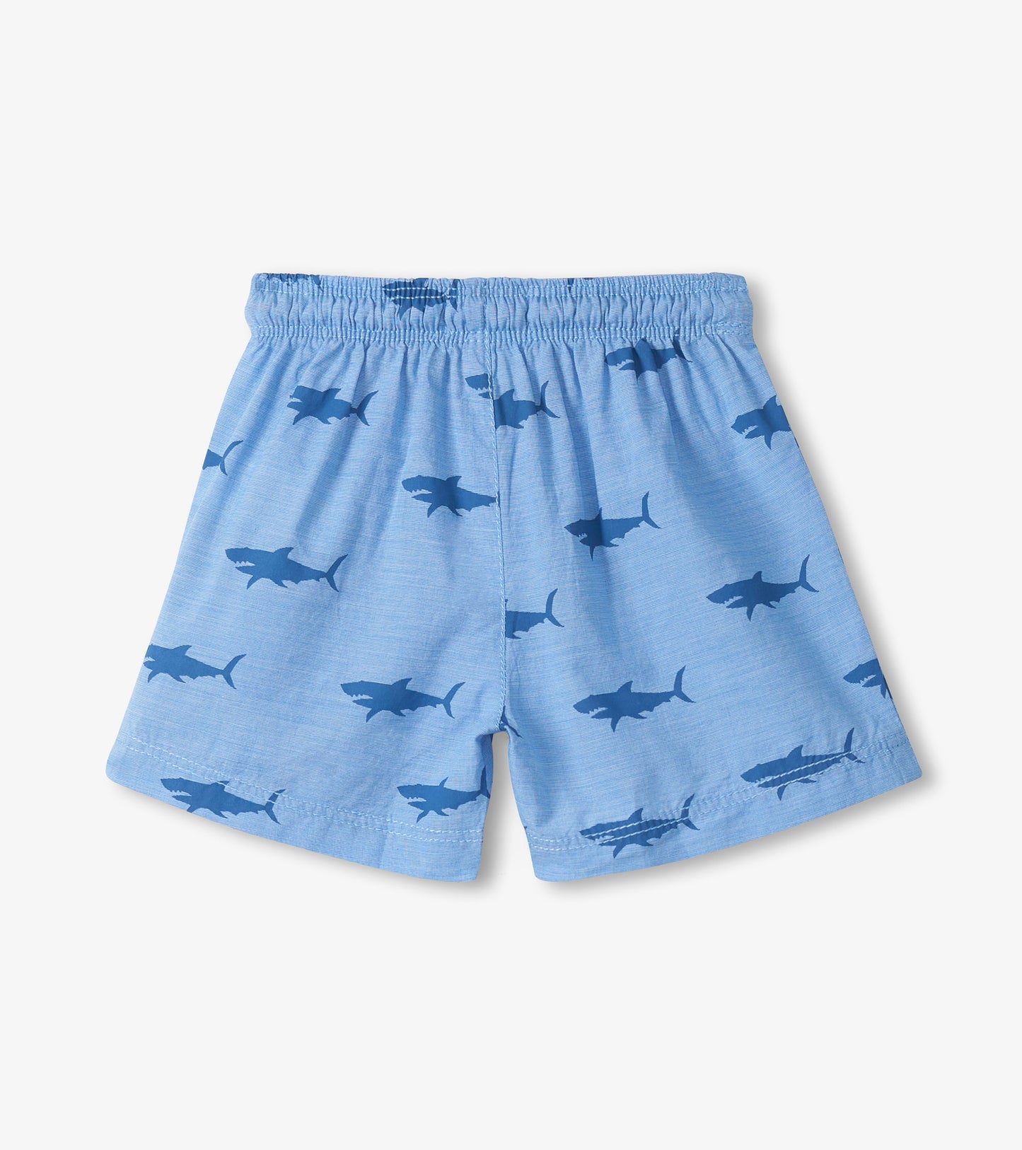 Light blue pull-on shorts with dark blue shark print and elastic waistband, front view