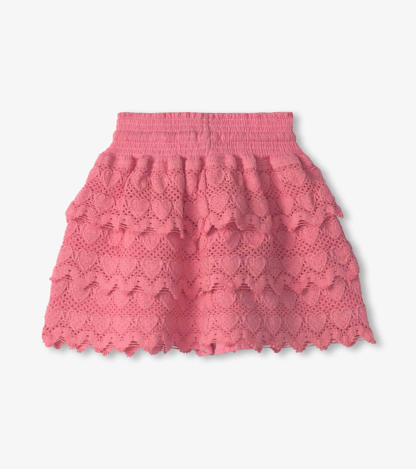 Pink skort featuring layered ruffles with heart patterns, elastic waistband, and a playful, lightweight design.