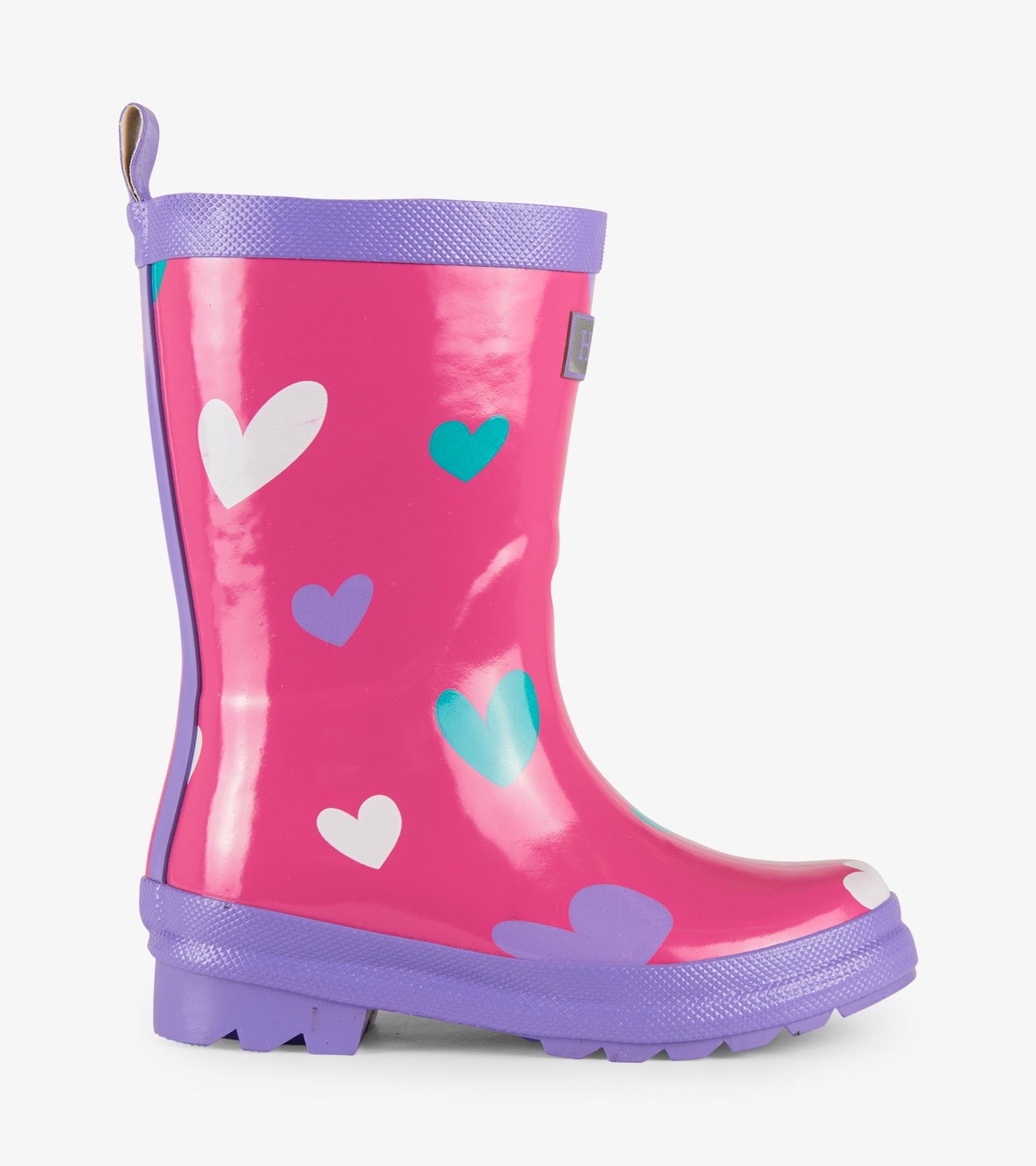Pink rain boots with colorful heart patterns and a purple sole, designed for kids. Side view showcasing glossy finish.