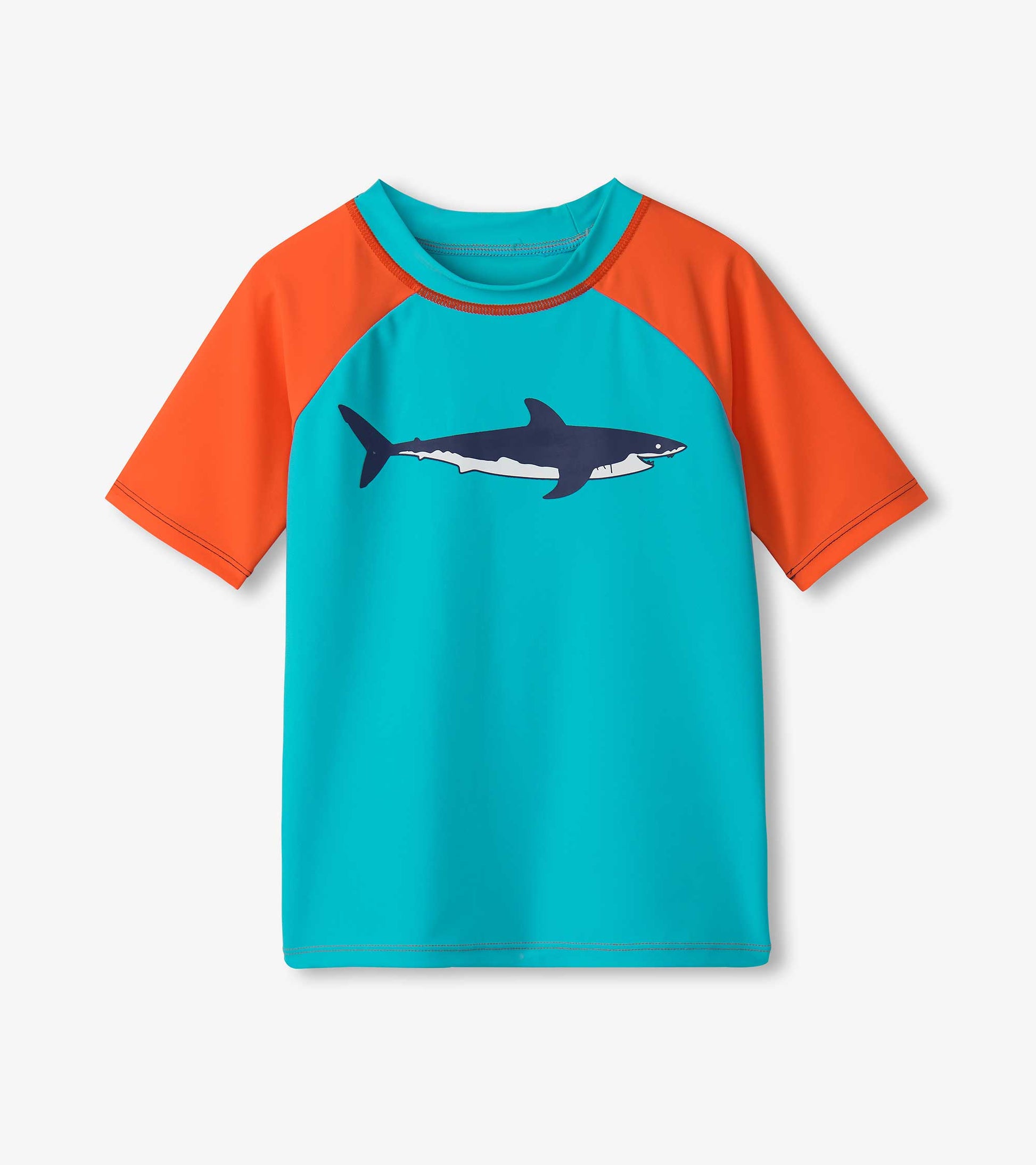 Short sleeve rashguard in turquoise with orange sleeves and a shark graphic on the front. Ideal for beach or pool use.