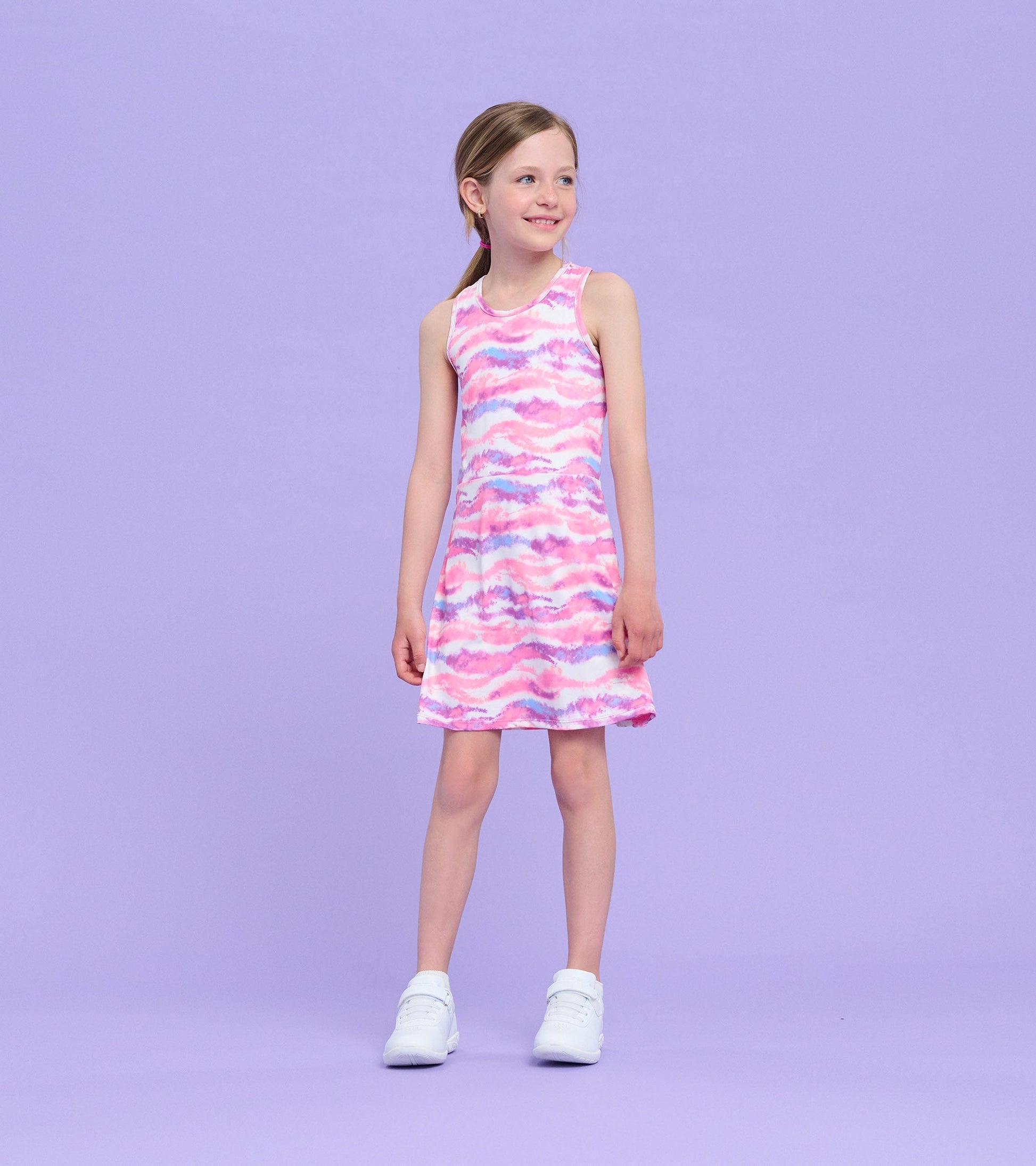 Girls' A-line dress featuring a candy ombre pattern in pink, purple, and white, perfect for active wear.