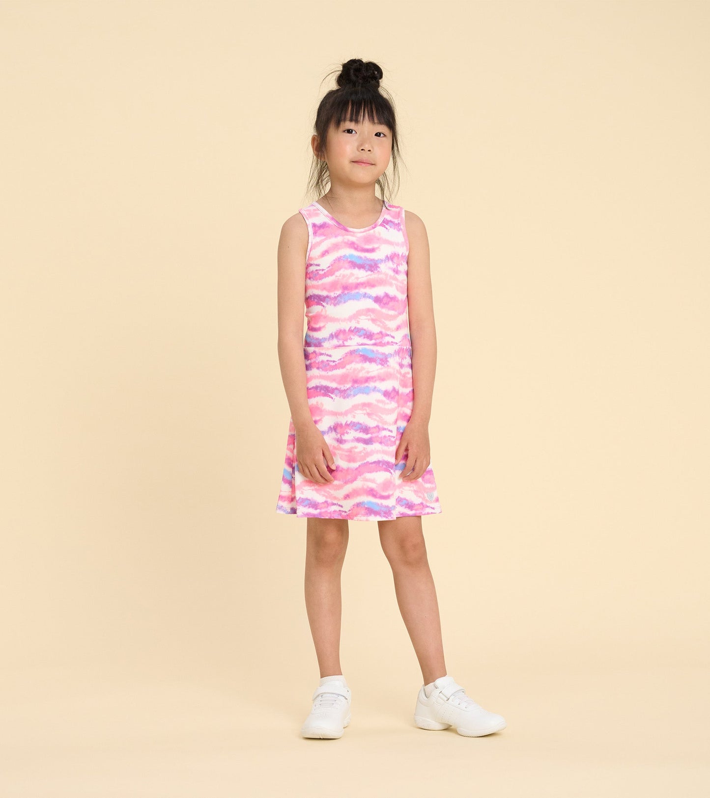 Girls' sleeveless A-line dress featuring a candy ombre pattern in pink and purple hues, perfect for active wear.