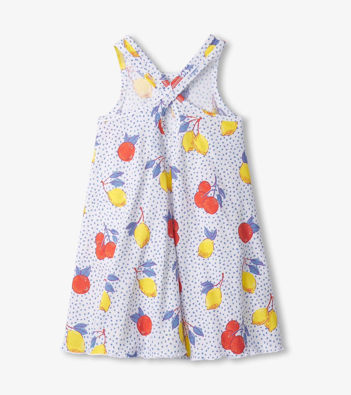 Light blue trapeze dress with a fruit print featuring lemons and cherries, designed with cross-back straps.