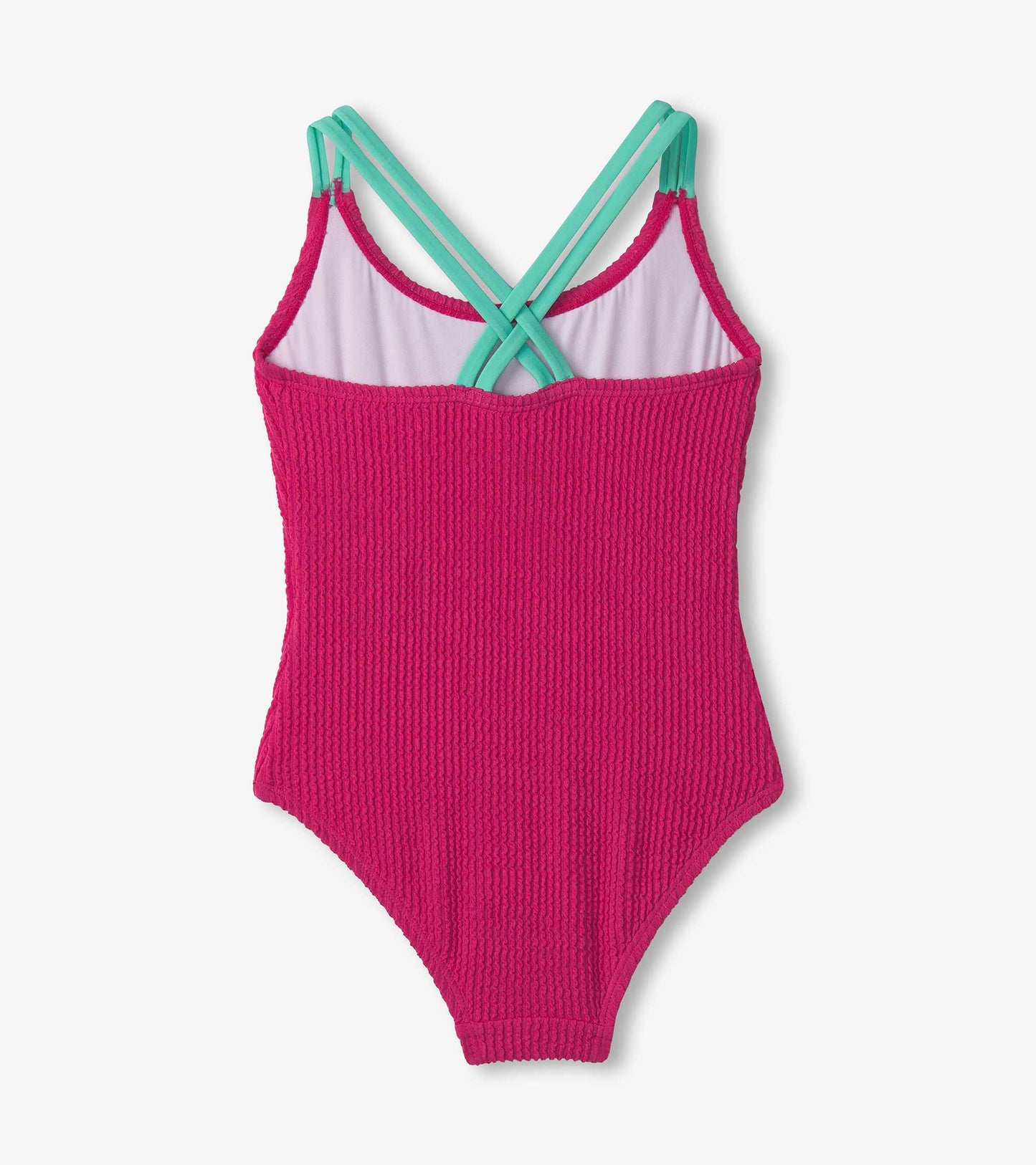 Fuchsia purple cross strap swimsuit with textured fabric and contrasting straps, designed for girls.