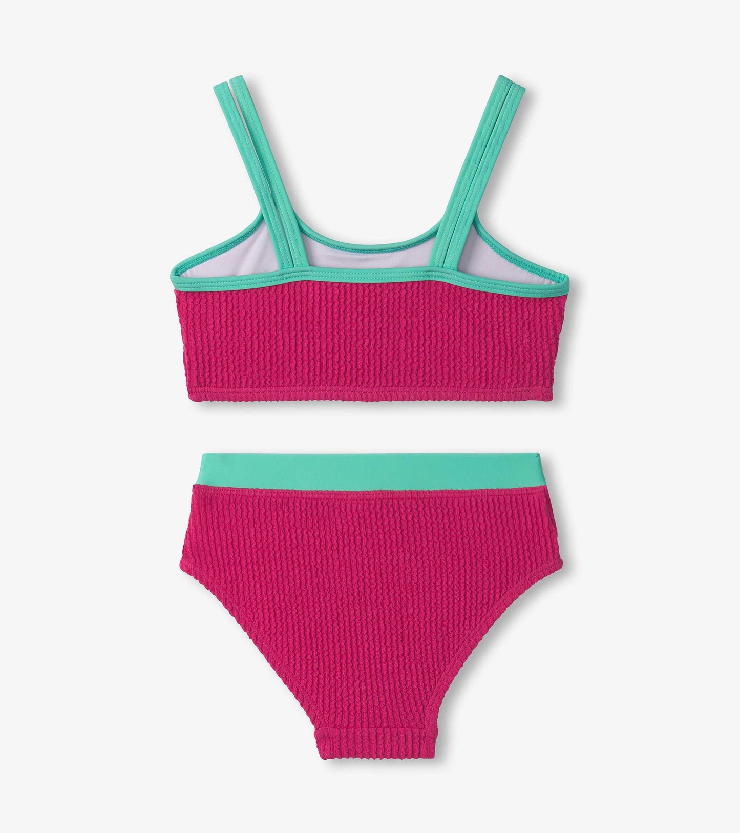 Fuchsia purple bikini set with textured fabric and turquoise straps, featuring a crop top and matching bottoms.