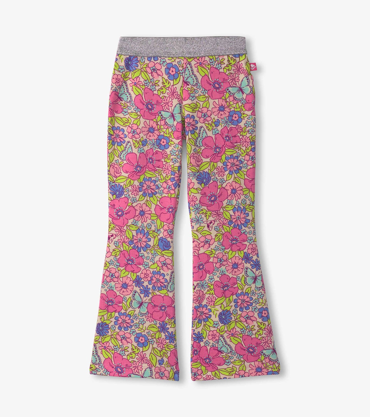 Pink bell-bottom pants featuring a vibrant floral pattern with green and blue accents. Stretchy waistband for comfort.