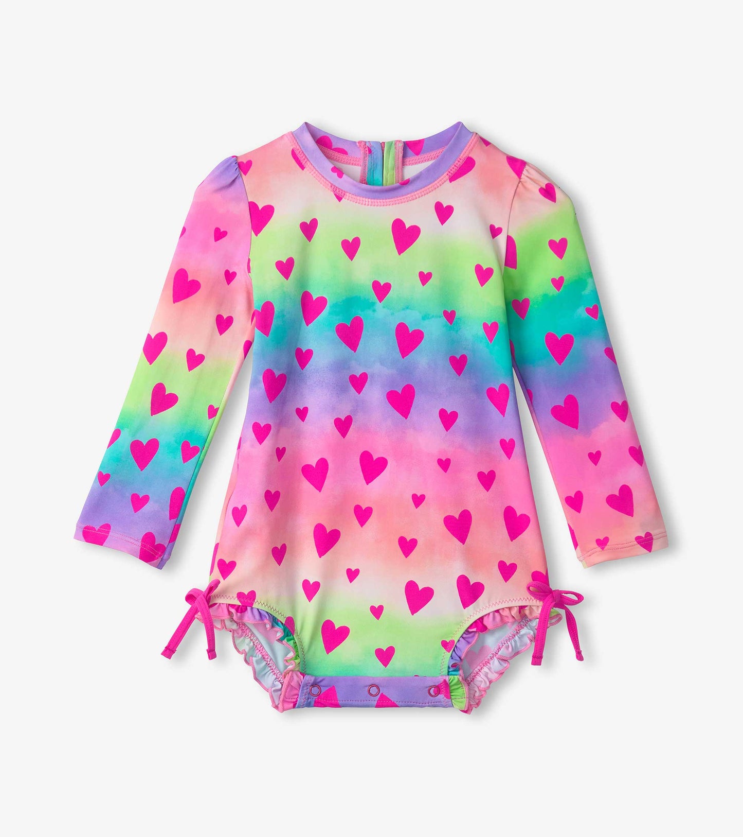 Long-sleeve swimsuit featuring a colorful gradient pattern with pink hearts and adjustable ties at the legs.