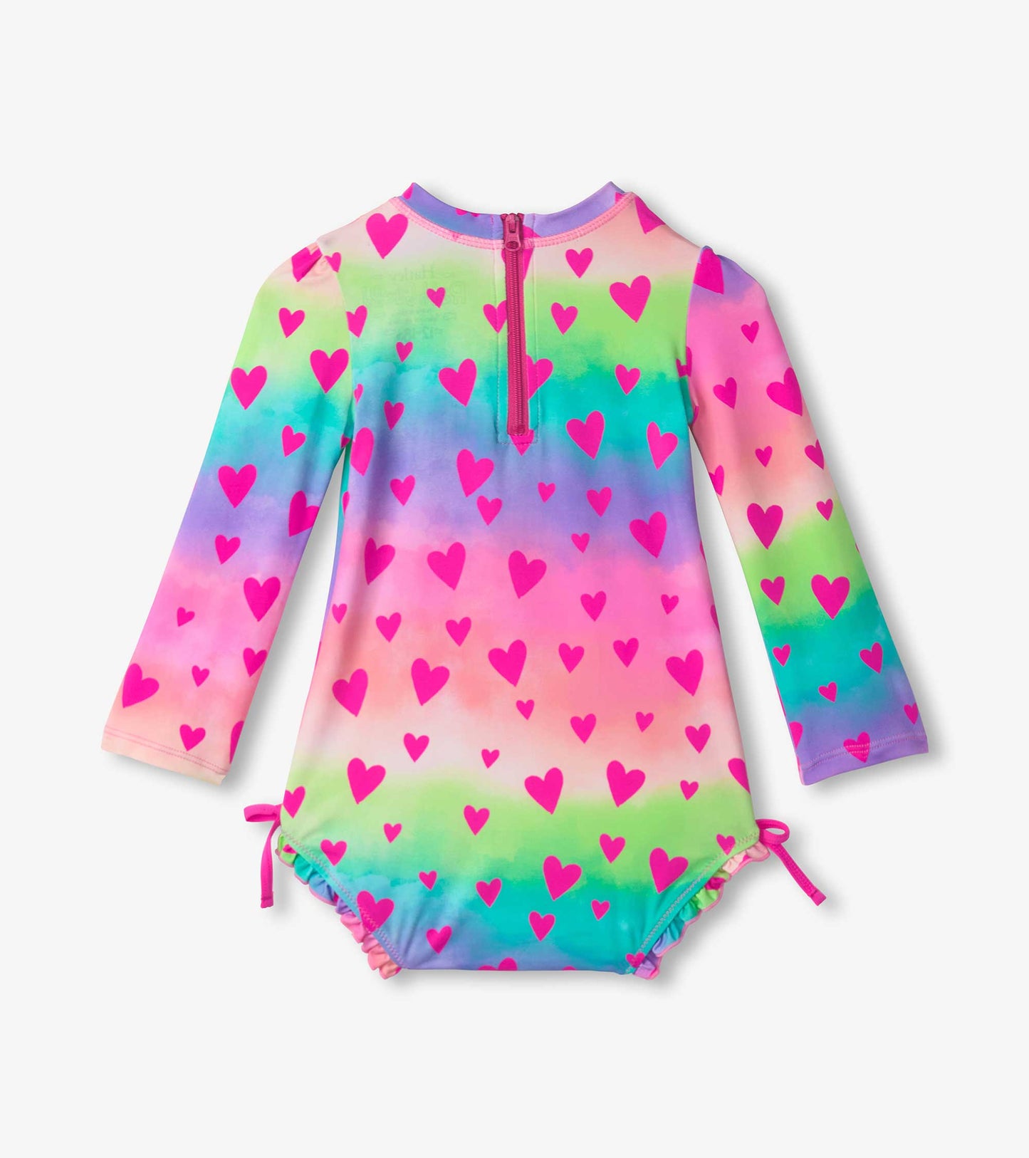 Long-sleeve rashguard swimsuit featuring a colorful gradient pattern with pink hearts, designed for baby girls.