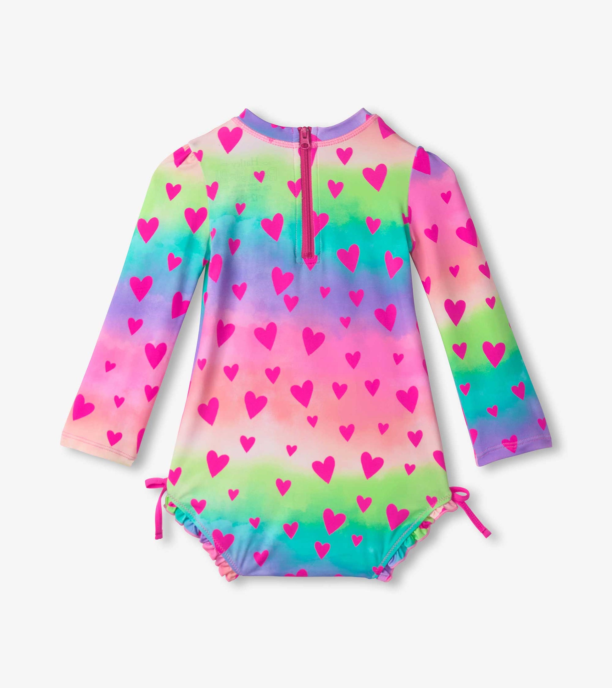 Long-sleeve rashguard swimsuit featuring a colorful gradient pattern with pink hearts, designed for baby girls.