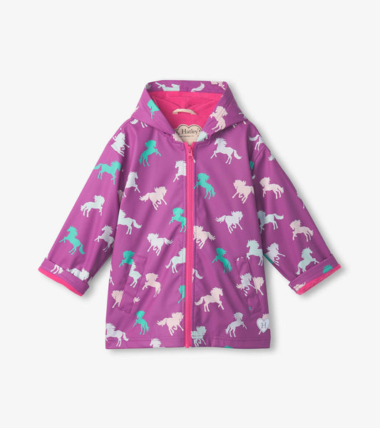 Purple zip-up rain jacket featuring colorful leaping horse patterns, with a hood and pink trim. Suitable for girls.