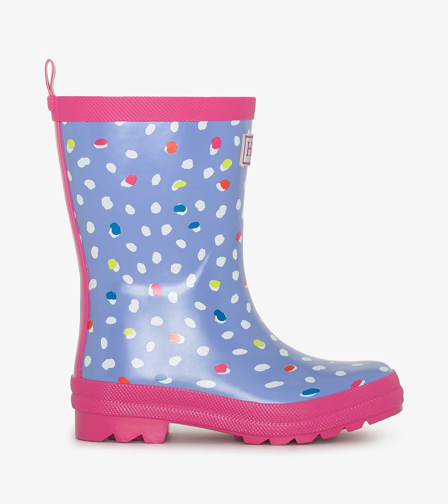 Shiny blue rain boots with colorful polka dots and a pink sole, designed for kids. Side view shows the height and shape.