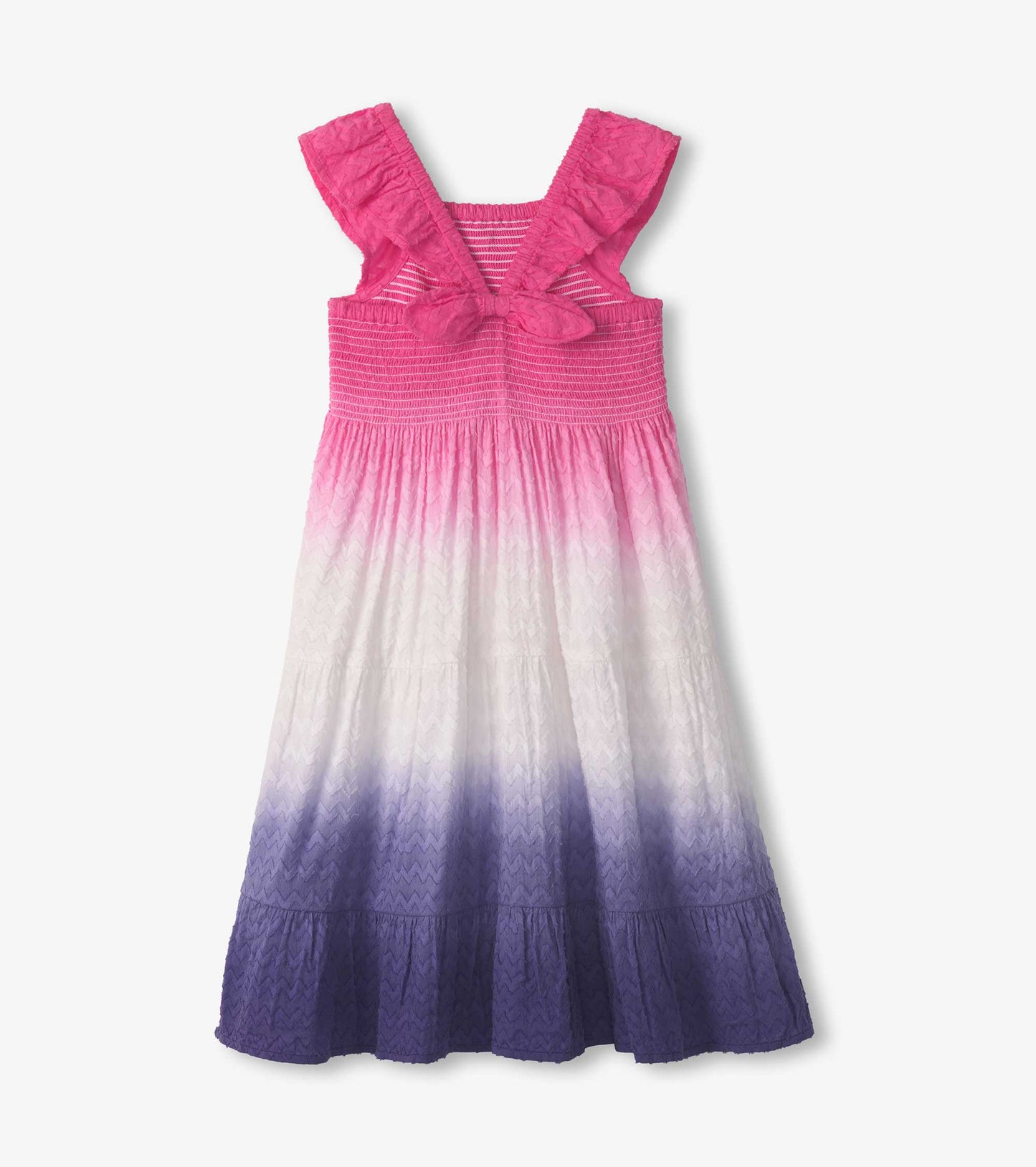 Purple dip dye smocked dress with ruffled straps, featuring a gradient from pink to white to purple.