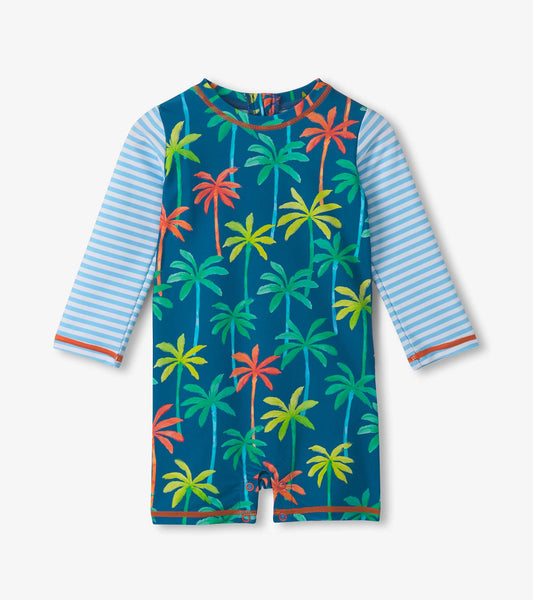 Blue one-piece rashguard featuring colorful palm tree prints and striped sleeves, suitable for baby boys.
