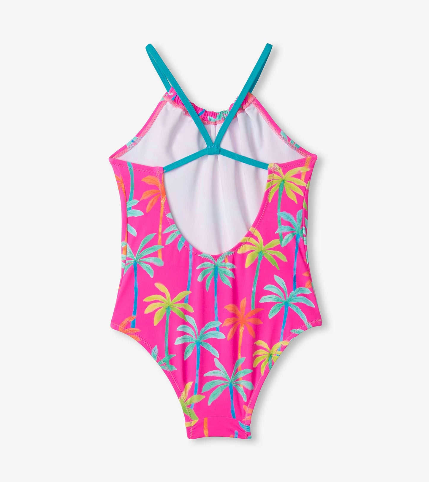 Bright pink swimsuit with colorful palm tree print, featuring a gathered front and crisscross straps at the back.