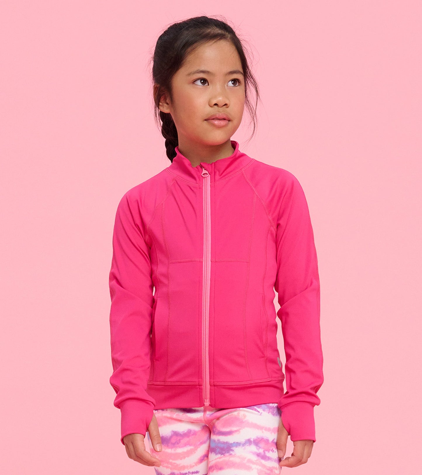 Bright pink active jacket with a zip front, long sleeves, and a fitted design, suitable for outdoor activities.