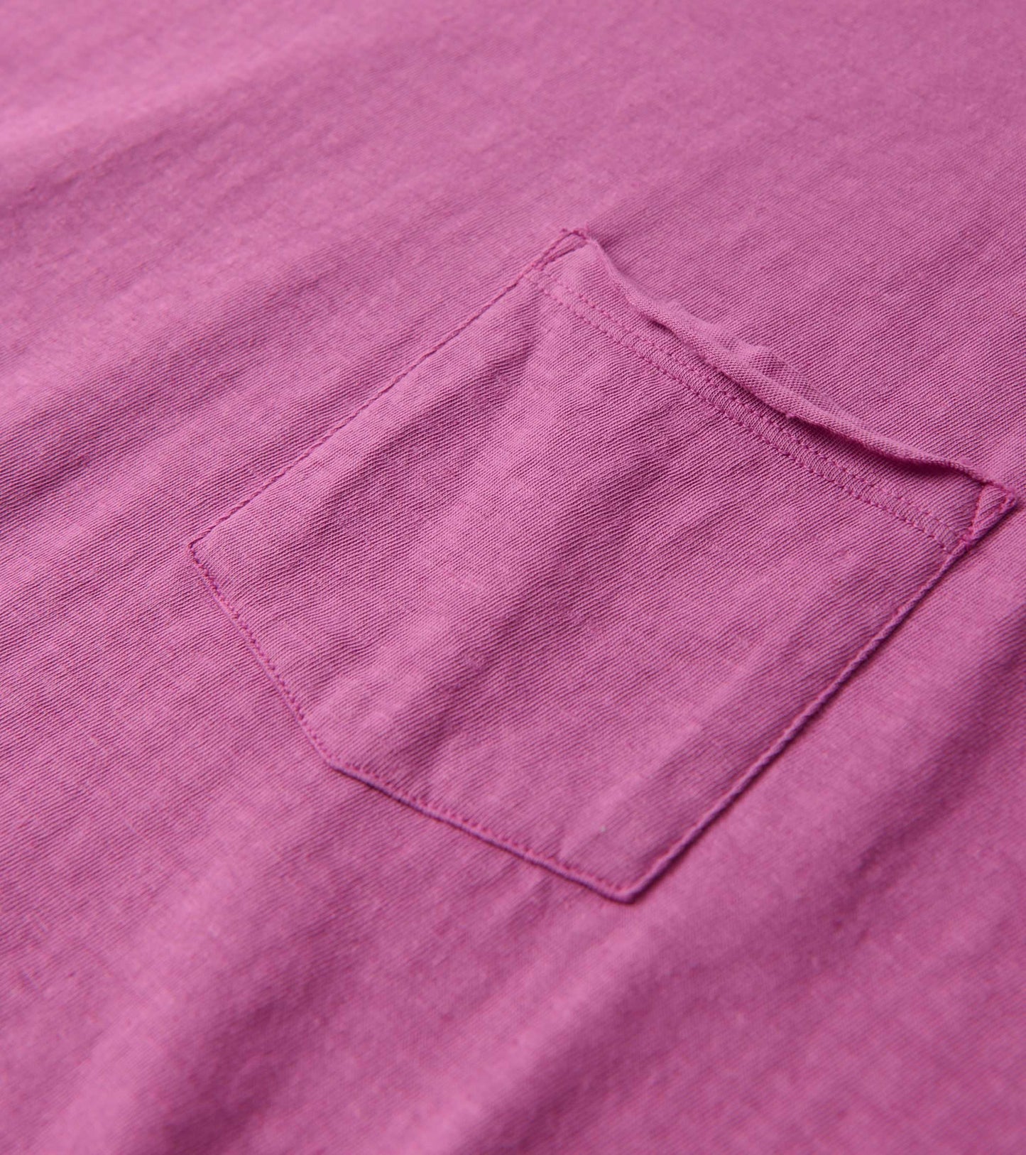Slouchy pocket tee in orchid color, featuring a simple pocket detail and soft, lightweight fabric.