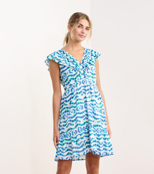 Ruffled sleeve dress in blue and green shibori wave pattern, featuring a fitted bodice and flared skirt.