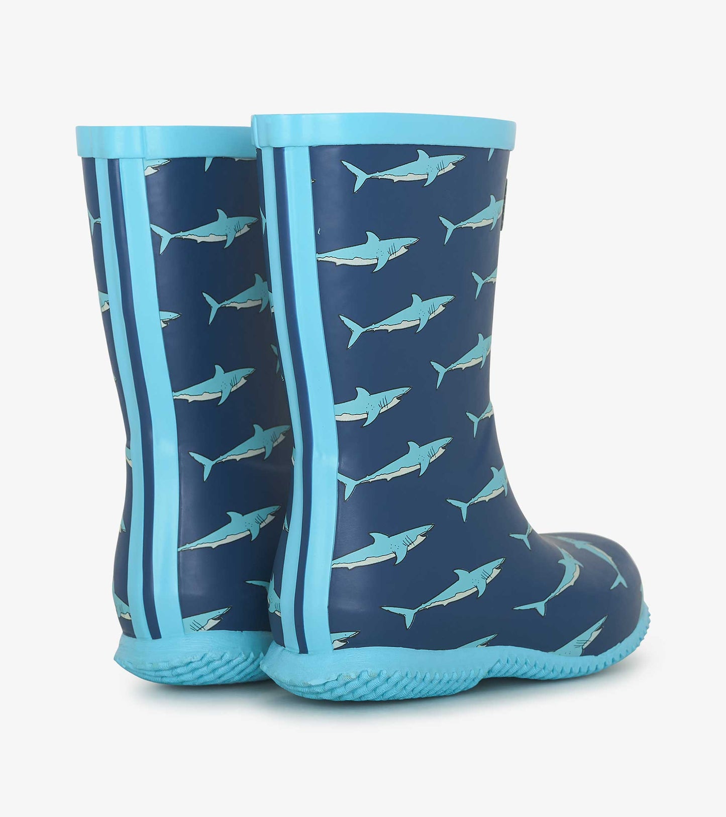Blue rain boots featuring a shark pattern, with light blue accents and a textured sole for grip.
