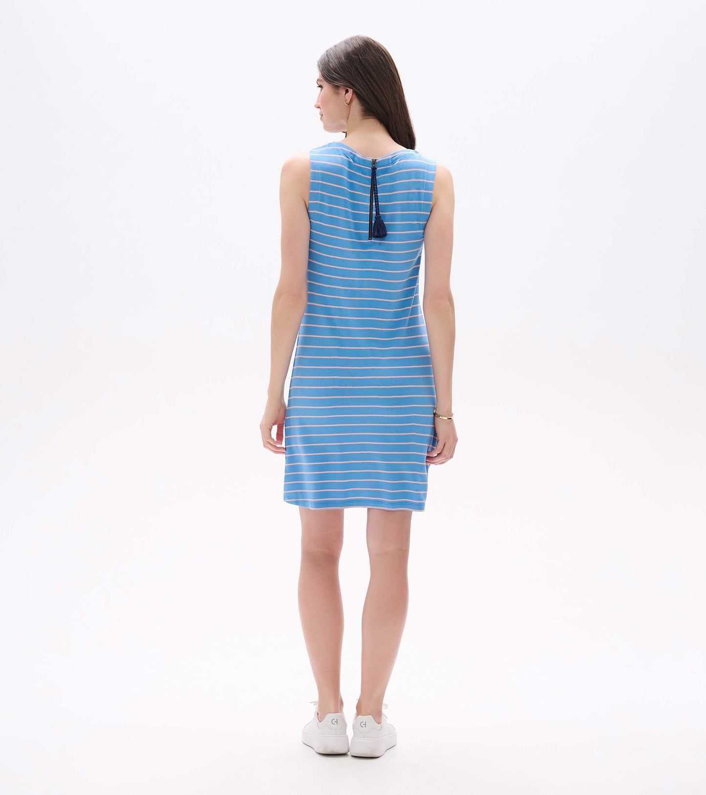 Back view of sleeveless sky-blue striped Sofia dress with visible zipper and tassel pull