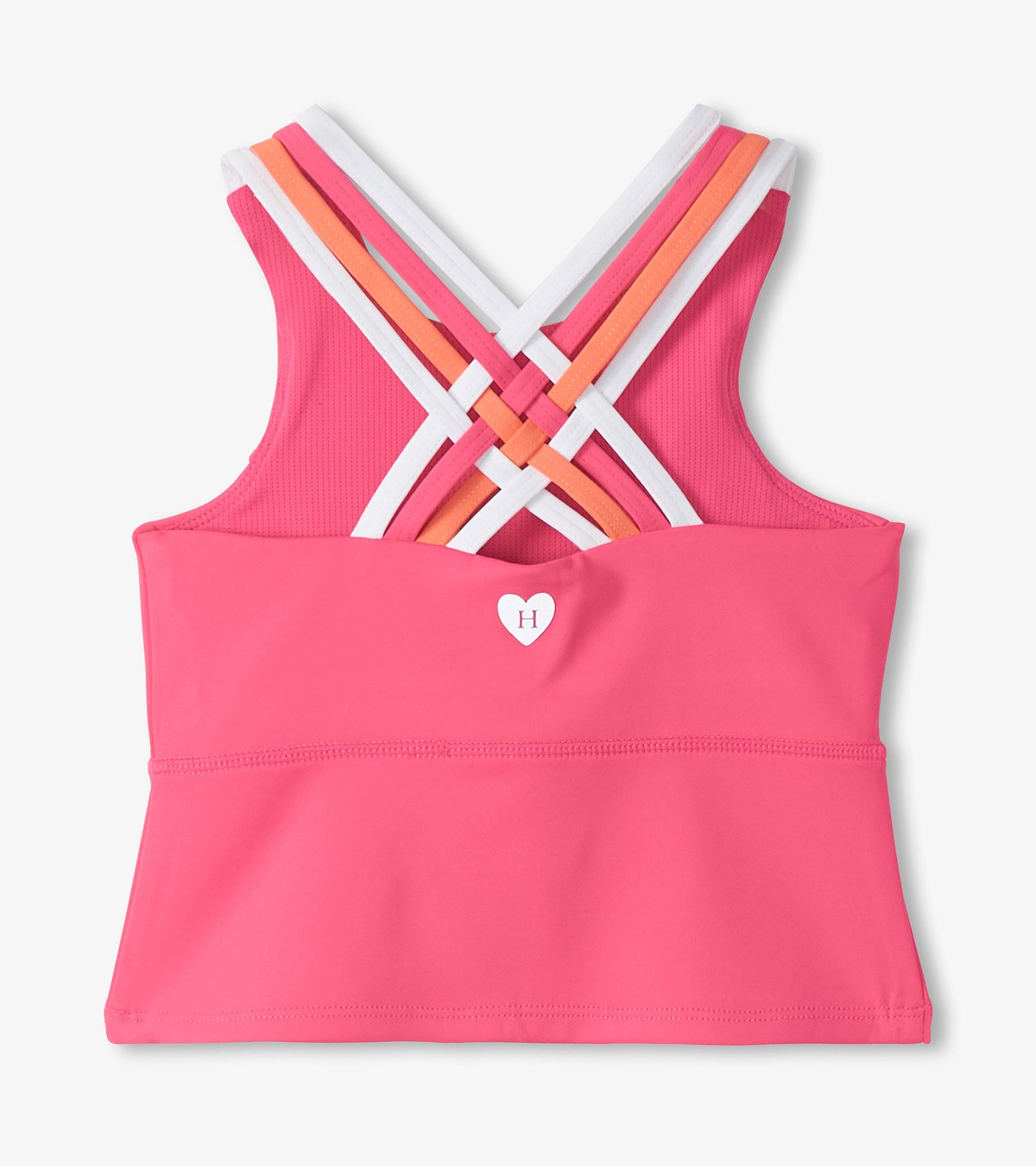 Pink girls active tank top with crisscross multicolor straps and small heart logo, front view