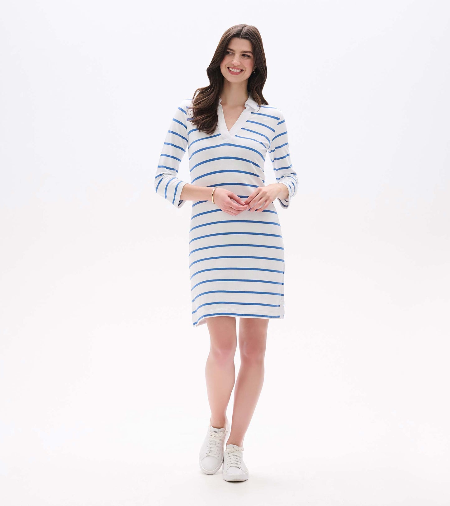Front full-length view of Taylor Dress in blue and white stripes with V-neck collar and side slit