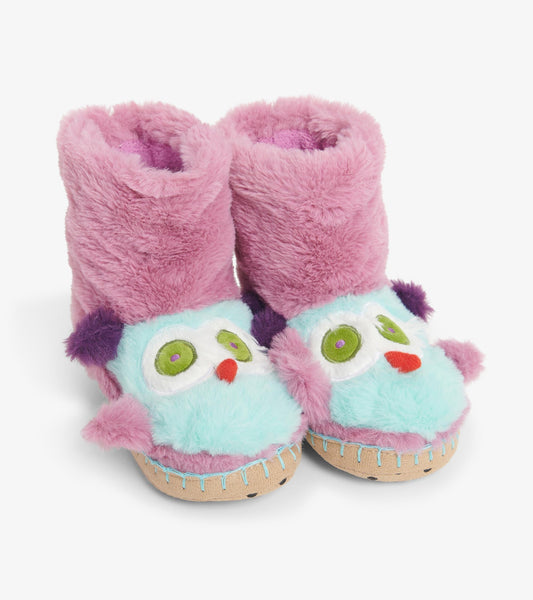 Colorful plush slippers shaped like owls, featuring pink and blue fur with embroidered eyes and beak.