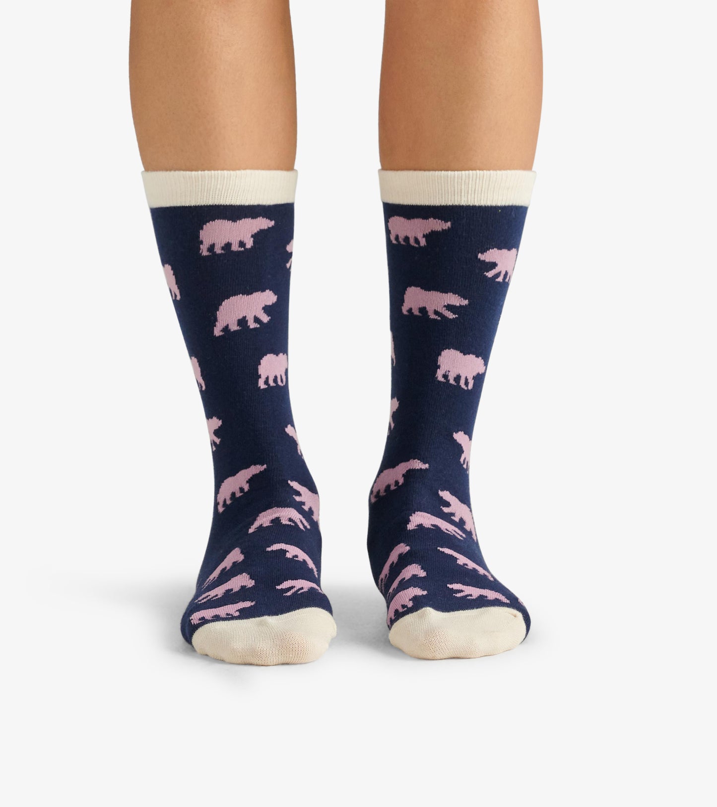 Navy crew socks featuring a pink bear pattern and a cream-colored cuff, designed for casual wear.