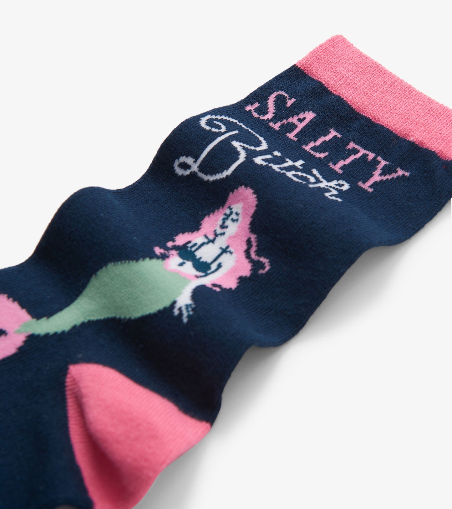 Navy crew socks featuring a mermaid design with pink accents and the text "SALTY Bitch." One size fits all.