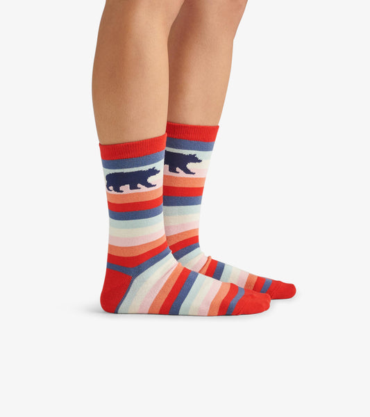 Colorful crew socks featuring horizontal stripes and a bear silhouette, perfect for casual wear.